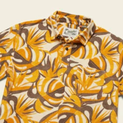 Howler Brothers Plusherman Terry Polo: Monstera Mash: Citron -Fashion Clothing S23 SS Shirts Plusherman Terry Polo Monstera Mash Angle 17793.1675981513