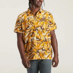 Howler Brothers Plusherman Terry Polo: Monstera Mash: Citron -Fashion Clothing S23 SS Shirts Plusherman Terry Polo Monstera Mash Front 42321.1675981510